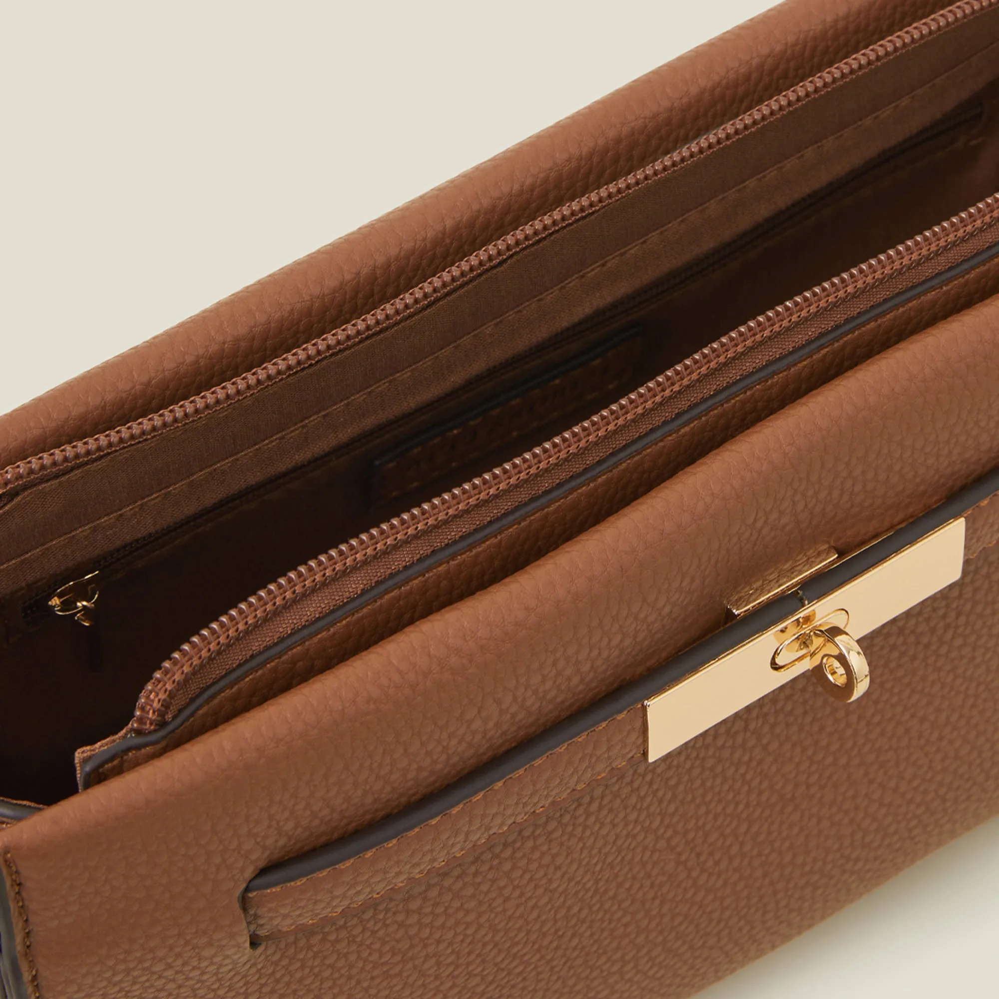 Brown Metal Twist-lock Sling Bag