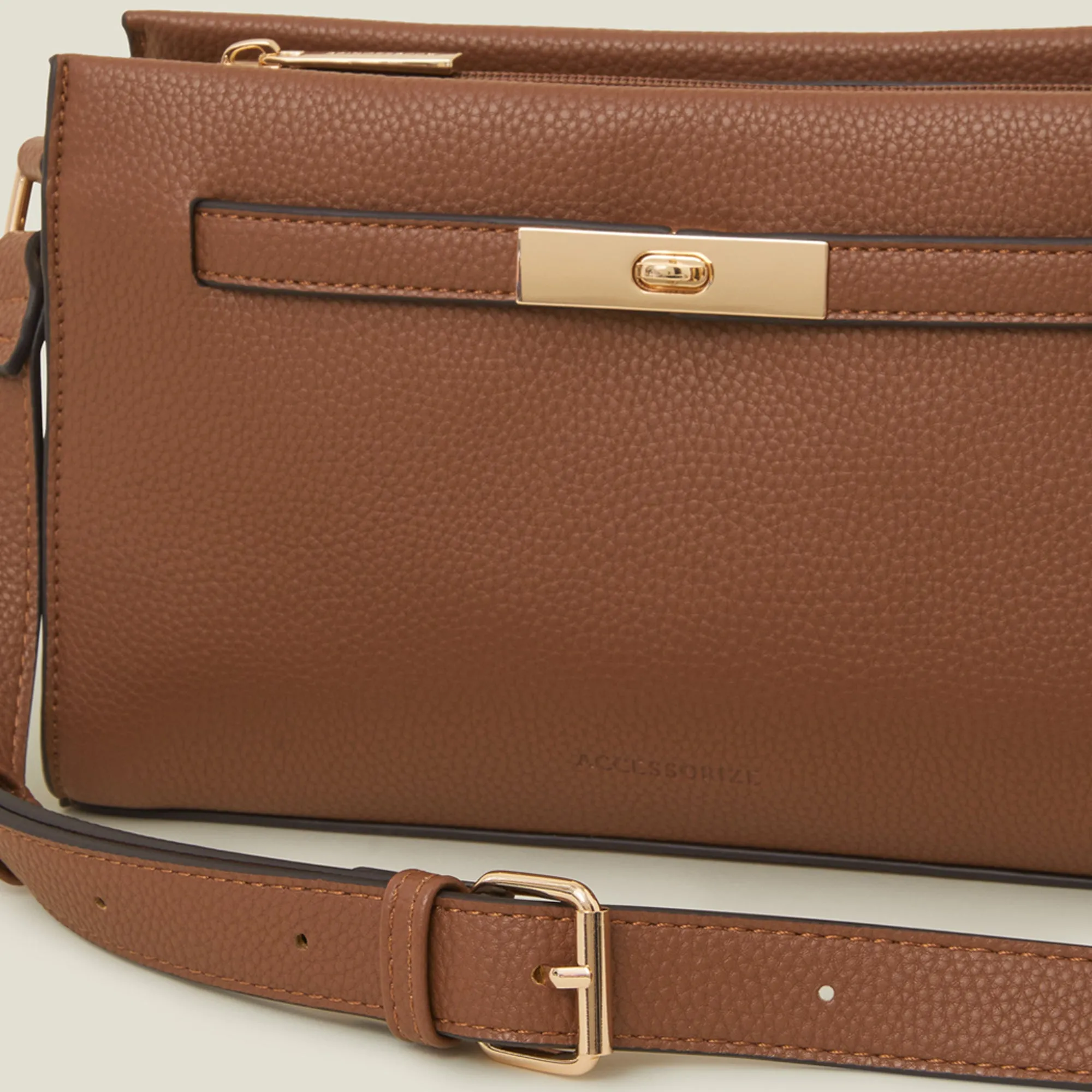 Brown Metal Twist-lock Sling Bag